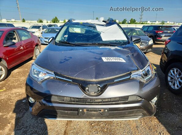 JTMDFREV1JJ735025 2018 TOYOTA RAV4 Gray Vista frontal