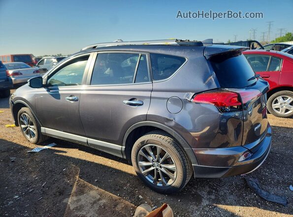 JTMDFREV1JJ735025 2018 TOYOTA RAV4 Gray Trasero izquierdo