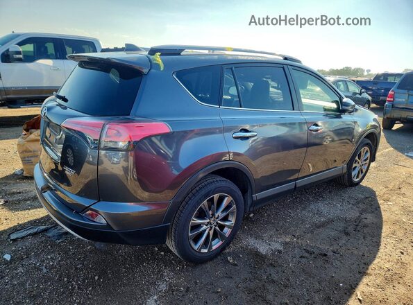 JTMDFREV1JJ735025 2018 TOYOTA RAV4 Gray Trasero derecho