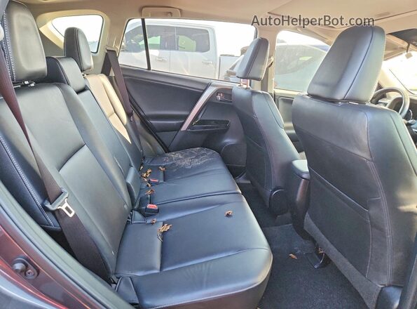 JTMDFREV1JJ735025 2018 TOYOTA RAV4 Gray Vista de los asientos traseros