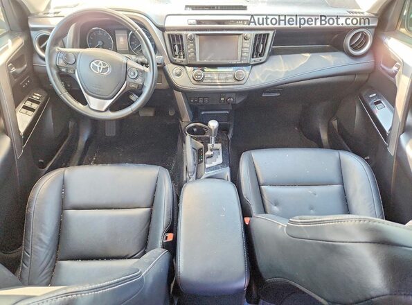 JTMDFREV1JJ735025 2018 TOYOTA RAV4 Gray Vista del salpicadero