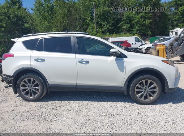 JTMDFREV3JJ214808 2018 TOYOTA RAV4 White Вид задньої частини салону