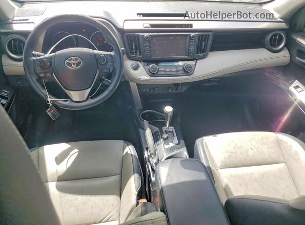 JTMDFREV4JJ720597 2018 TOYOTA RAV4 White Widok deski rozdzielczej