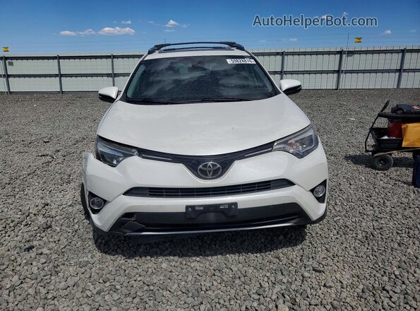 JTMDFREV4JJ720597 2018 TOYOTA RAV4 White Widok z przodu