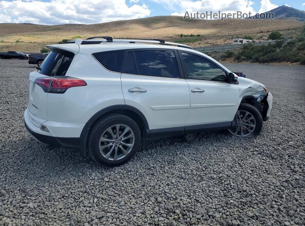 JTMDFREV4JJ720597 2018 TOYOTA RAV4 White Tył prawy