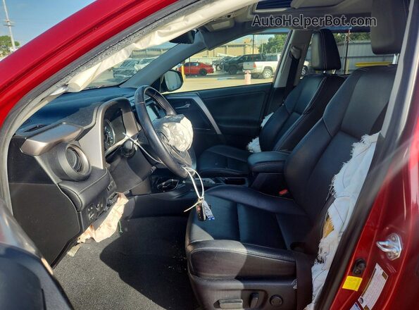 JTMDFREV5GJ061311 2016 TOYOTA RAV4 Красный Вид салона спереди
