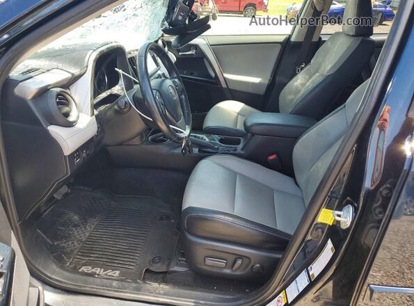 JTMDFREV5HD202071 2017 TOYOTA RAV4 Blue Vista interior delantera