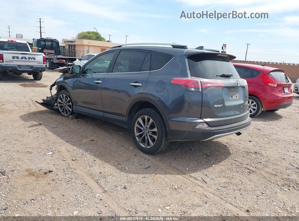 JTMDFREV5JD239546 2018 TOYOTA RAV4 Gray Trasero izquierdo