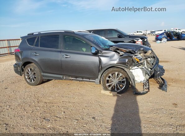 JTMDFREV5JD239546 2018 TOYOTA RAV4 Gray Vista interior trasera