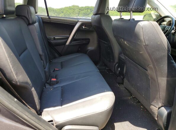 JTMDFREV6JJ251674 2018 TOYOTA RAV4 Gray Вид задньої частини салону