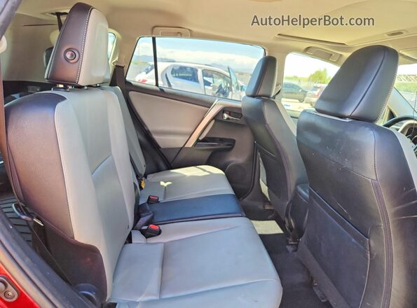 JTMDFREV7JD239189 2018 TOYOTA RAV4 Burgundy Widok wnętrza z tyłu