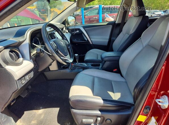 JTMDFREV7JD239189 2018 TOYOTA RAV4 Burgundy Widok wnętrza z przodu