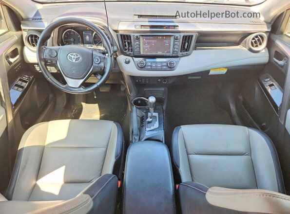 JTMDFREV7JD239189 2018 TOYOTA RAV4 Burgundy Widok deski rozdzielczej