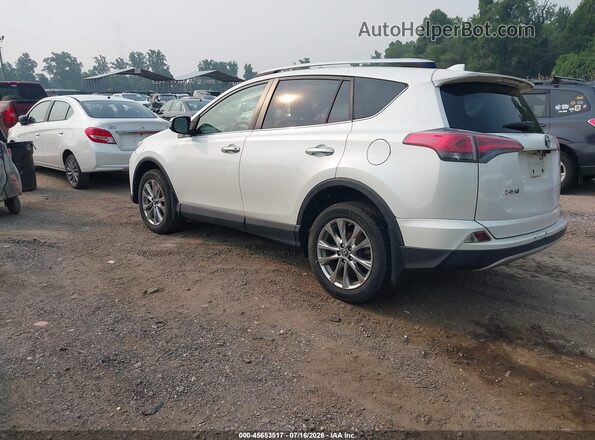 JTMDFREV8GJ054899 2016 TOYOTA RAV4 White Trasero izquierdo