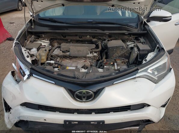 JTMDFREV8GJ054899 2016 TOYOTA RAV4 White Vista trasera