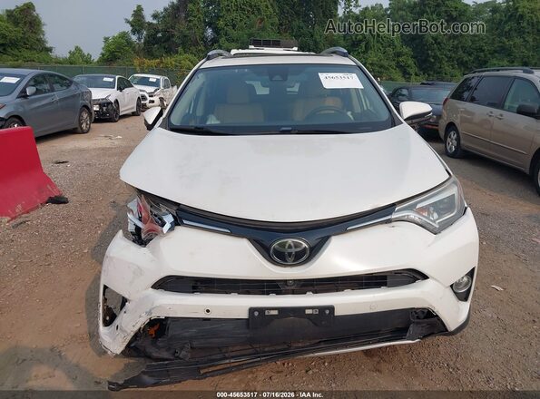 JTMDFREV8GJ054899 2016 TOYOTA RAV4 White Vista del cuadro de instrumentos