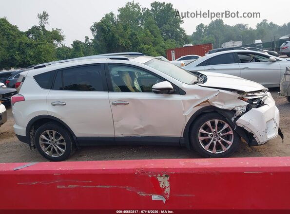 JTMDFREV8GJ054899 2016 TOYOTA RAV4 White Vista interior trasera