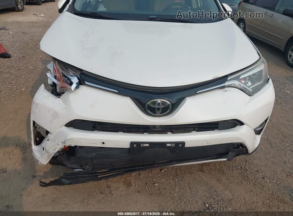 JTMDFREV8GJ054899 2016 TOYOTA RAV4 White 