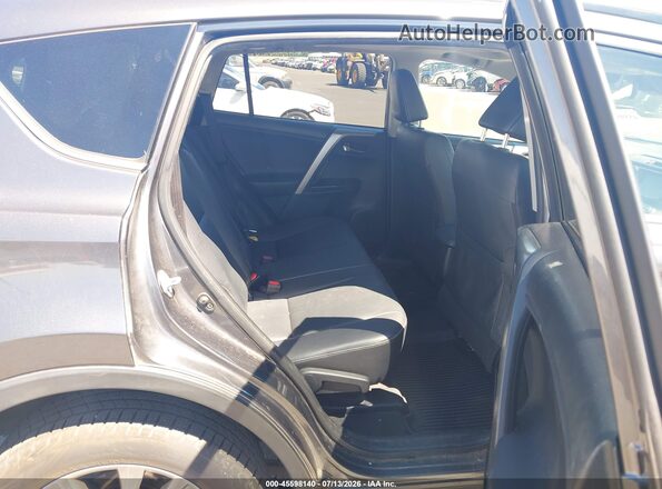 JTMDFREV8GJ077373 2016 TOYOTA RAV4 Gray Widok naklejki z numerem VIN