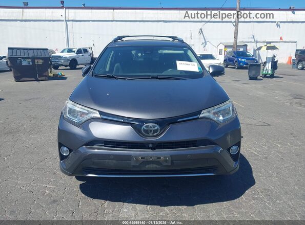 JTMDFREV8GJ077373 2016 TOYOTA RAV4 Gray Widok wnętrza z tyłu
