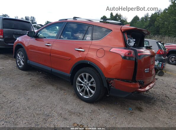 JTMDFREV9GJ068410 2016 TOYOTA RAV4 Orange Rear left