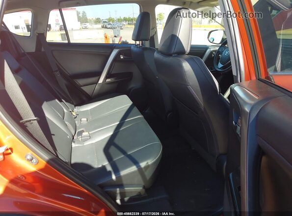 JTMDFREV9GJ073803 2016 TOYOTA RAV4 Orange Widok naklejki z numerem VIN