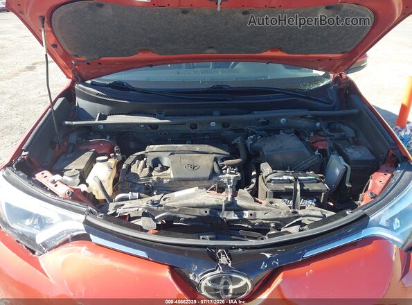 JTMDFREV9GJ073803 2016 TOYOTA RAV4 Orange Widok z tyłu