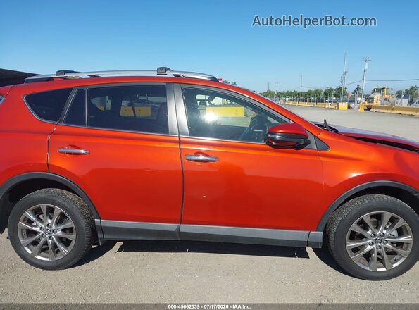 JTMDFREV9GJ073803 2016 TOYOTA RAV4 Orange 