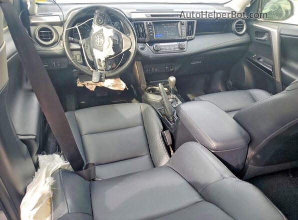 JTMDFREV9HJ169982 2017 TOYOTA RAV4 White Dashboard view