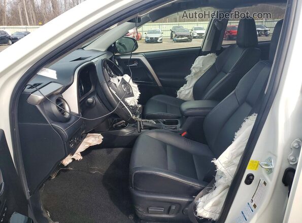 JTMDFREV9HJ169982 2017 TOYOTA RAV4 White Front interior view