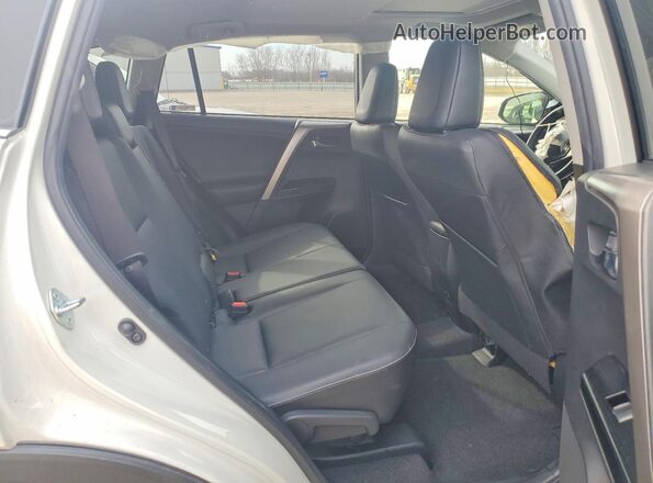 JTMDFREV9HJ169982 2017 TOYOTA RAV4 White Rear interior view