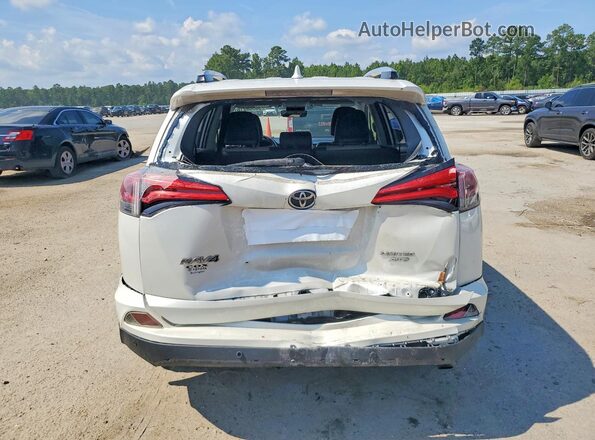 JTMDFREVXGJ082283 2016 TOYOTA RAV4 White Հետևի տեսք