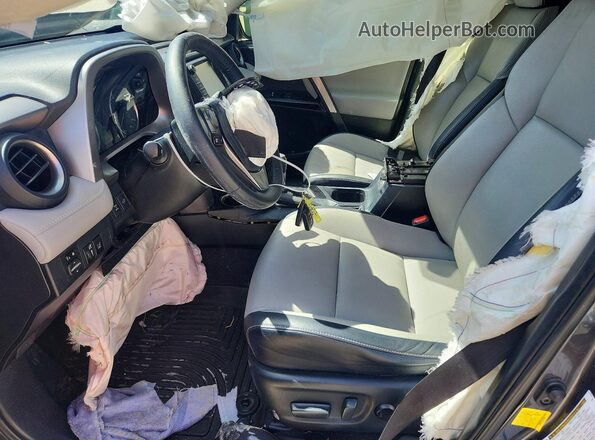 JTMDFREVXHJ153984 2017 TOYOTA RAV4 Gray Вид салону спереду