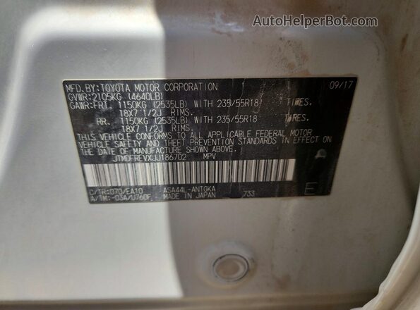 JTMDFREVXJJ186702 2018 TOYOTA RAV4 White VIN კოდის სტიკერის ხედი