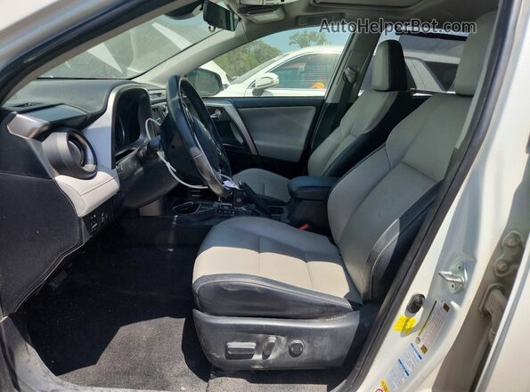 JTMDFREVXJJ186702 2018 TOYOTA RAV4 White წინა სალონის ხედი