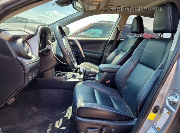 JTMDFREVXJJ226616 2018 TOYOTA RAV4 Silver წინა სალონის ხედი