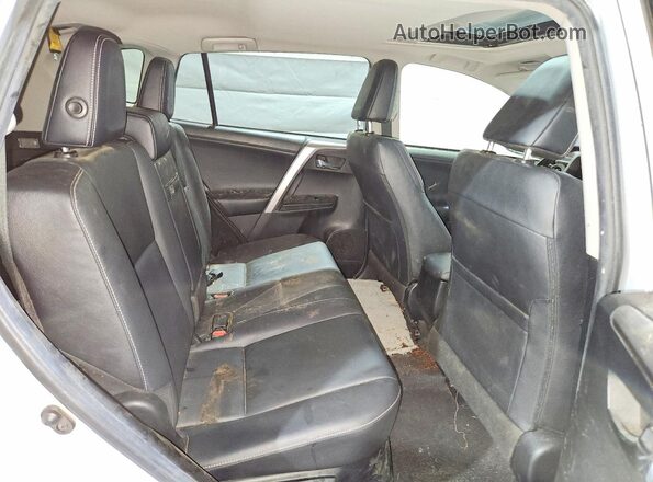 JTMDJREV0GD022638 2016 TOYOTA RAV4 Silver Vista interior trasera