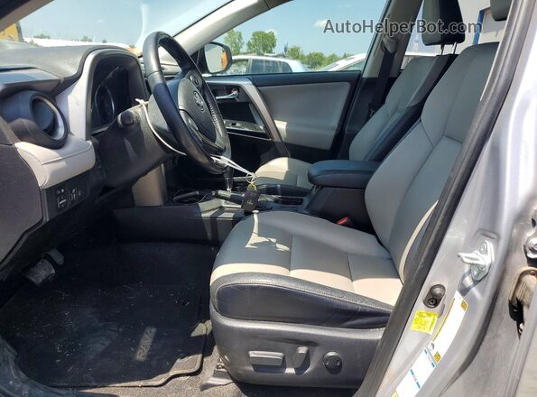 JTMDJREV0HD107903 2017 TOYOTA RAV4 Silver Front interior view