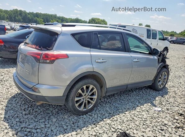 JTMDJREV0HD107903 2017 TOYOTA RAV4 Silver Rear right