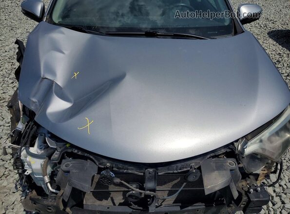JTMDJREV0HD107903 2017 TOYOTA RAV4 Silver Engine compartment view