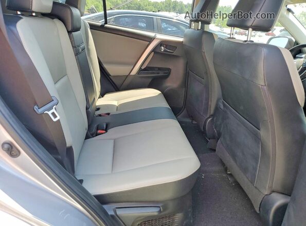JTMDJREV0HD107903 2017 TOYOTA RAV4 Silver Rear interior view