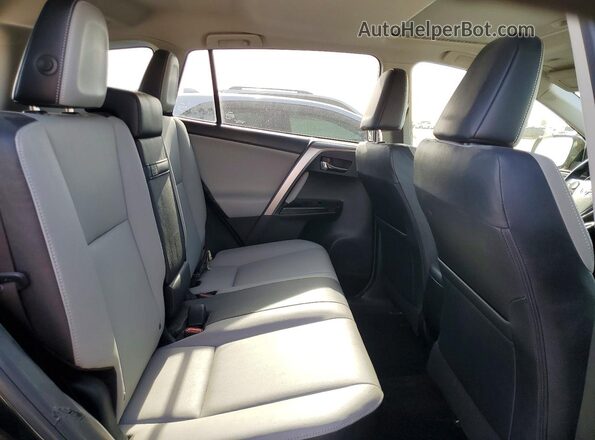 JTMDJREV0HD109702 2017 TOYOTA RAV4 Угольный Вид задней части салона