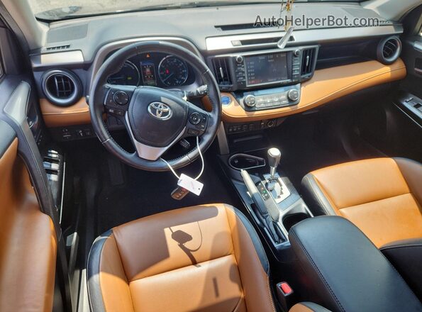 JTMDJREV1GD010563 2016 TOYOTA RAV4 Black Vista del salpicadero