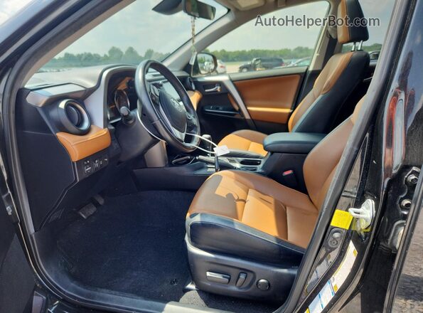 JTMDJREV1GD010563 2016 TOYOTA RAV4 Black Vista interior delantera