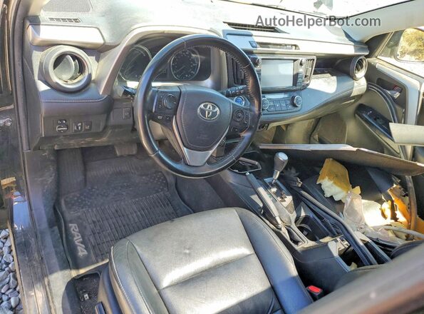 JTMDJREV1HD068867 2017 TOYOTA RAV4 Black ხელსაწყოთა პანელის ხედი