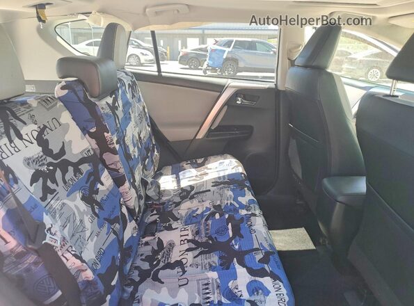 JTMDJREV2HD124041 2017 TOYOTA RAV4 Silver Vista interior trasera