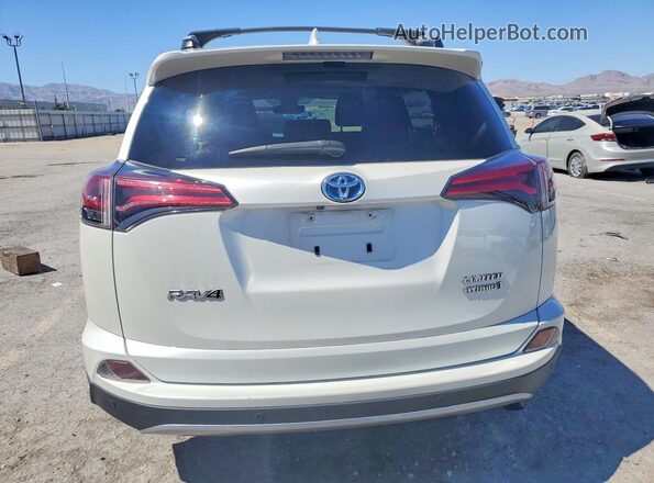 JTMDJREV2HD124041 2017 TOYOTA RAV4 Silver Vista trasera