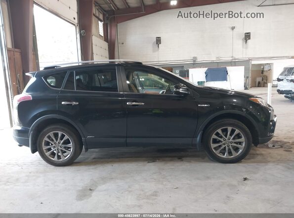 JTMDJREV2HD144709 2017 TOYOTA RAV4 HYBRID Black Widok wnętrza z tyłu