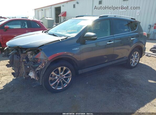 JTMDJREV3HD065632 2017 TOYOTA RAV4 HYBRID Gray Vista tres cuartos delantera izquierda