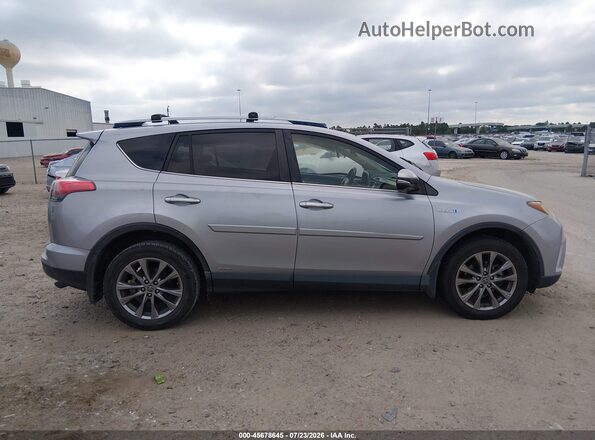 JTMDJREV3HD140944 2017 TOYOTA RAV4 HYBRID Silver Rear interior view